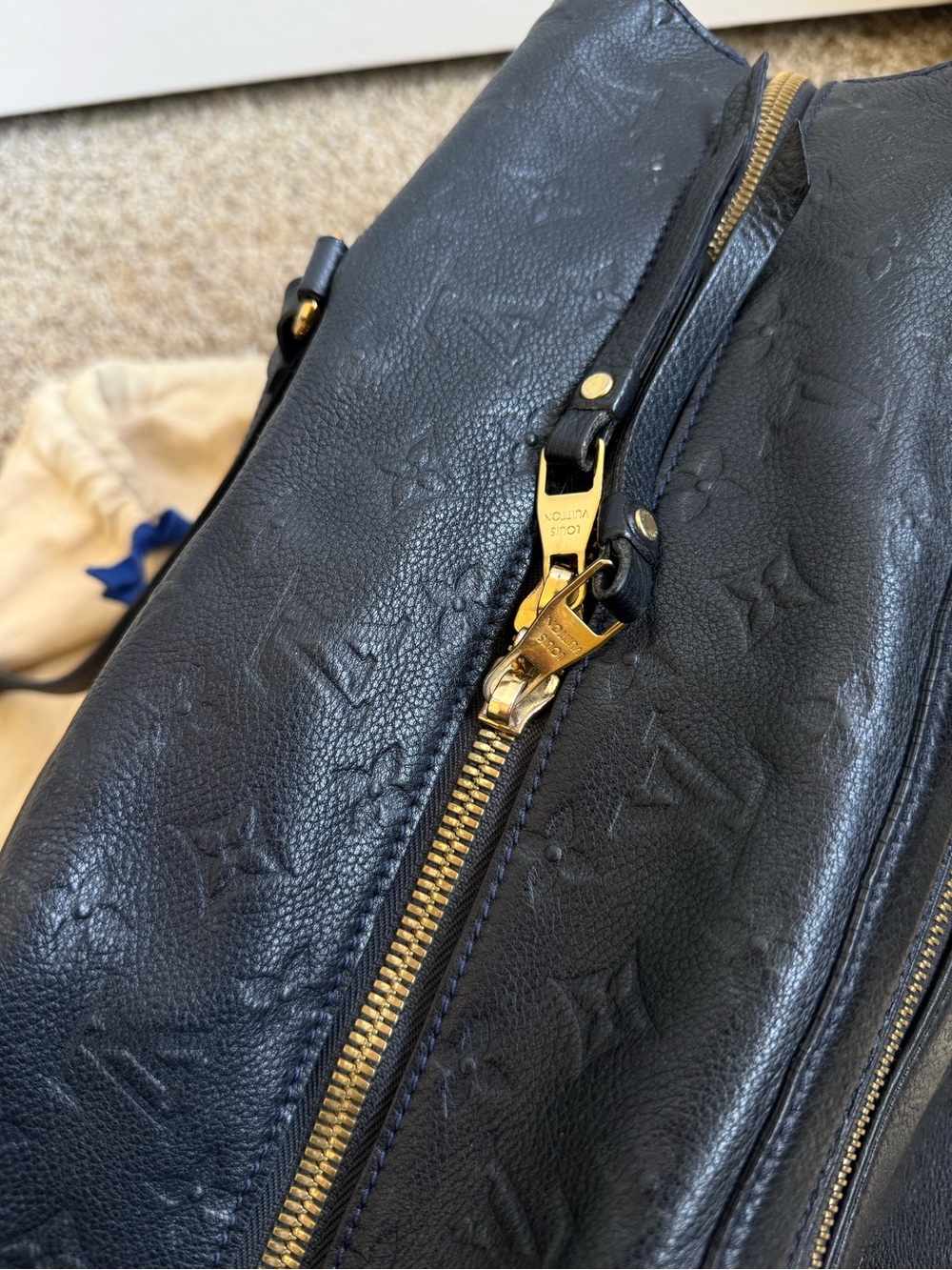Authentic Louis Vuitton Monogram Empreinte Lumineuse GM bag in Navy Blue - Picture 4 of 16